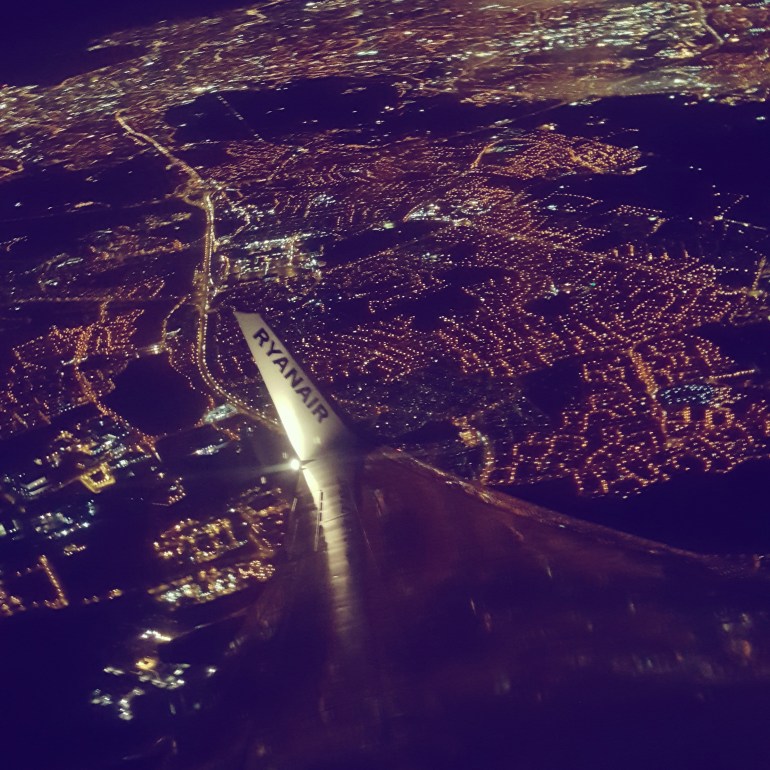 Nighttime view over London from plane